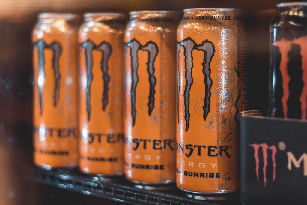 five Monster Energy cans